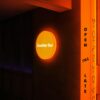 Vibrant neon signage for 'Another Bar' with a stylish design, open till late at night.