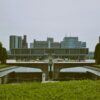 Exterior view of Hiroshima Peace Memorial Museum showcasing modern architecture and landscaped gardens.