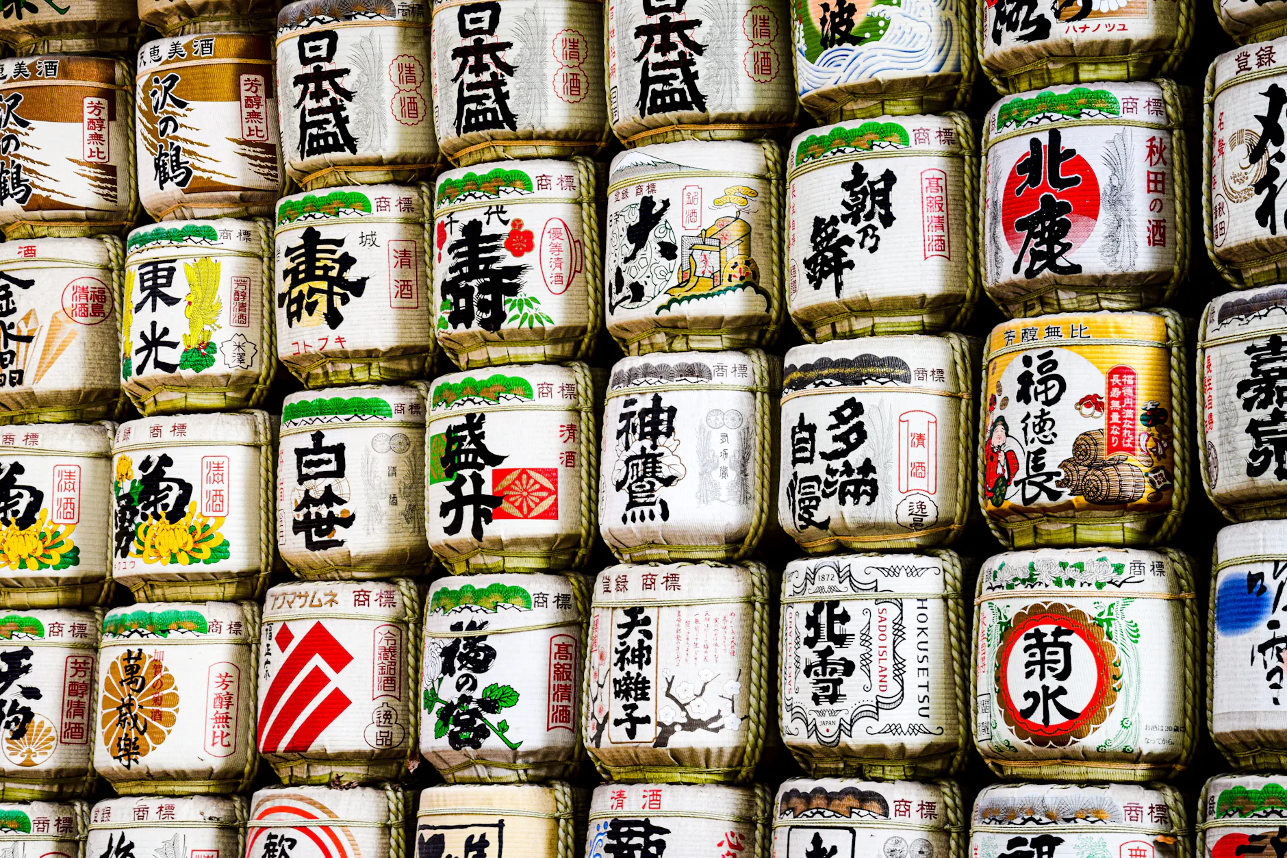 Stacked traditional sake barrels at Meiji Shrine, Tokyo, Japan.