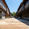 Stroll down the historic streets of Higashi Chaya in Kanazawa, showcasing traditional wooden architecture.