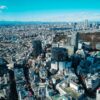 A stunning aerial shot of Tokyo showcasing its sprawling urban skyline and famous landmarks.