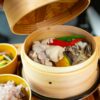 Explore a delightful traditional Japanese steamed dish with vegetables in Tokyo's Setagaya City.
