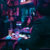 Experience the vibrant nightlife in a Tokyo izakaya, capturing the essence of Japanese dining culture.