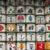 A collection of traditional sake barrels in Shibuya, Tokyo, showcasing Japanese culture.