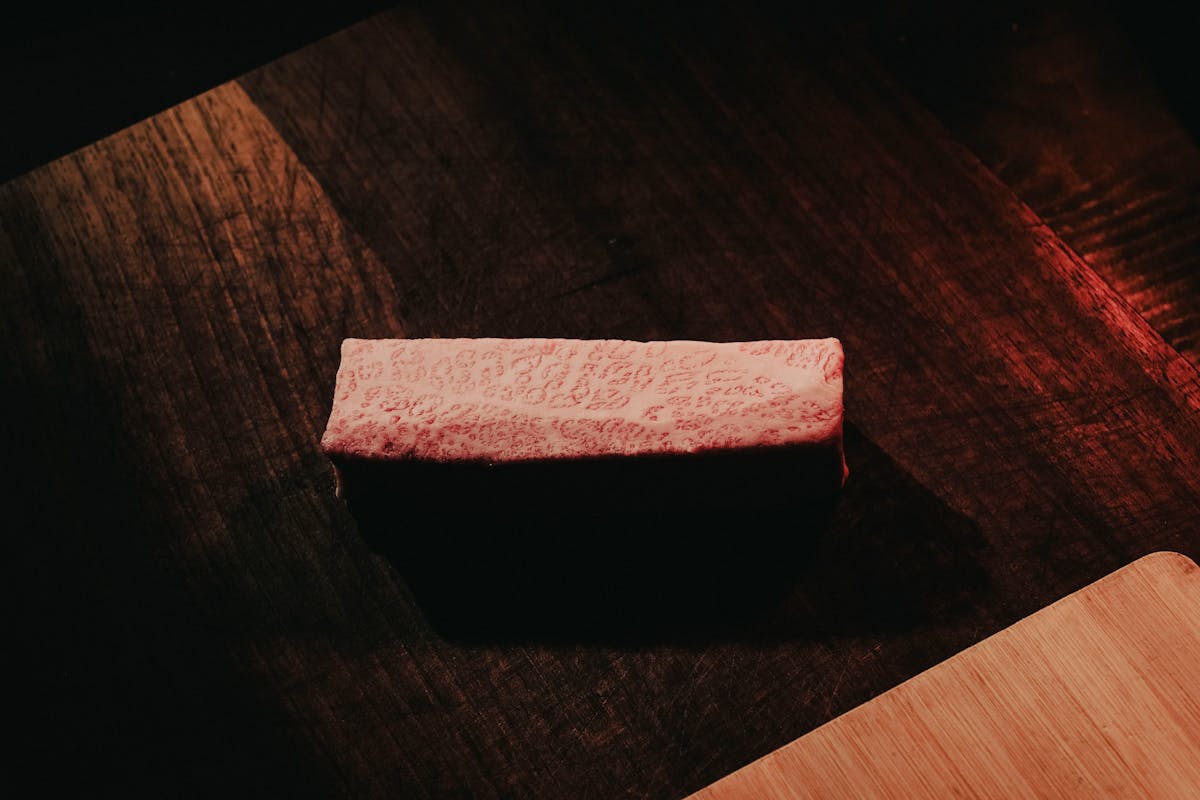 Raw wagyu beef block showing incredible marbling