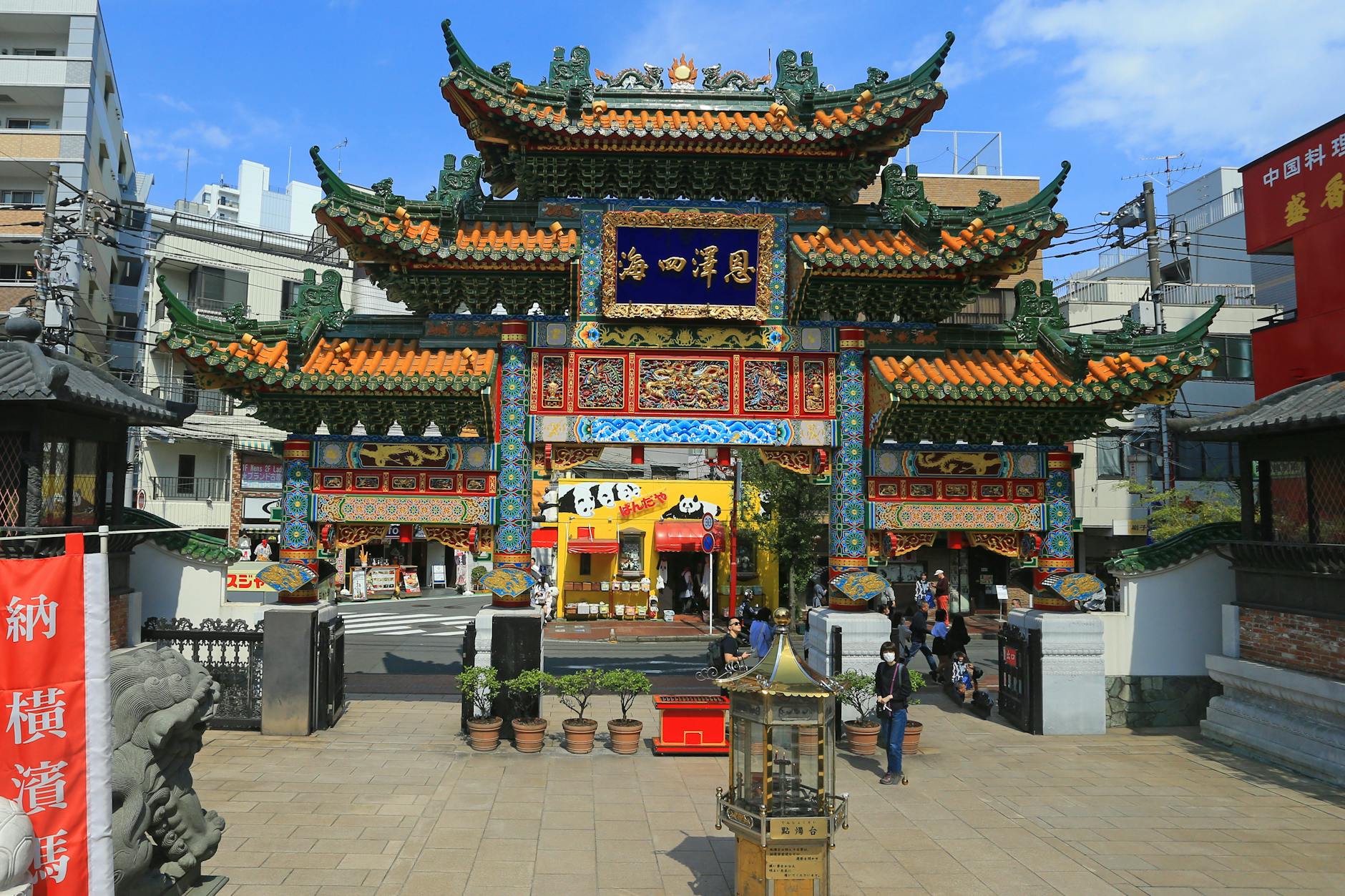 Vibrant traditional Chinese gate in Yokohama Chinatown, Japan captures cultural essence.